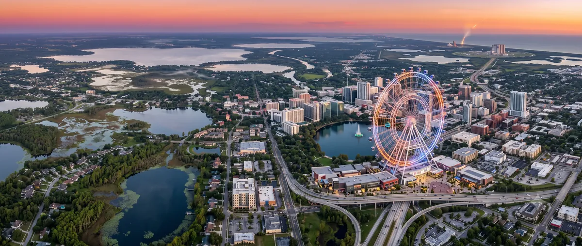 Aerial view of downtown Orlando and the Central Florida lakes at sunset